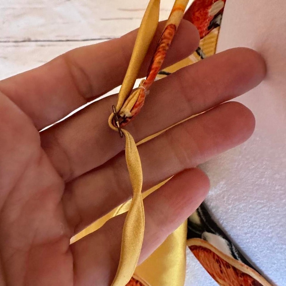 Show me your Mumu yellow silk wrap top with orange slices and leaves print, s... - Picture 5 of 8